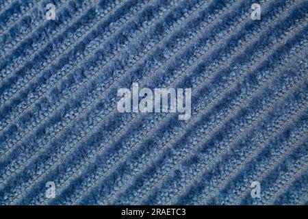 Closeup of blue corduroy fabric as patterned textured background for design purpose Stock Photo