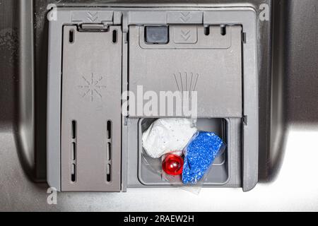 dishwasher capsule in tablet receiver for design purpose Stock Photo