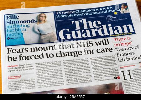 3 July 2023.  Headline on front page of Guardian reads Fears mount that NHS will be forced to charge for care. Stock Photo
