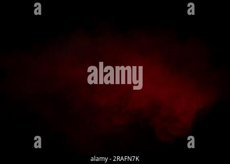 Orange and red steam on a black background. Copy space. Stock Photo