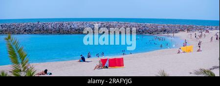 Espinho, Porto, Portugal, Europe - June 21, 2023: Panoramic view of Praia Vigiada in the summer holiday with people enjoying the sunshine on the Atlan Stock Photo