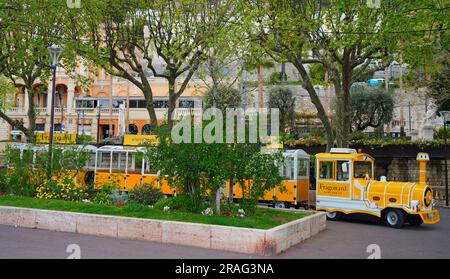 GRASSE, FRANCE -17 APR 2023- View of the Little Tourist Train from the Fragonard perfume museum and factory in Grasse, Provence, France. Stock Photo