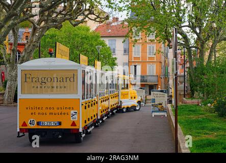 GRASSE, FRANCE -17 APR 2023- View of the Little Tourist Train from the Fragonard perfume museum and factory in Grasse, Provence, France. Stock Photo