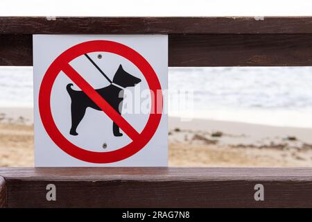 sign on the sea with dogs no entry isolated on the background of the beach. High quality photo Stock Photo