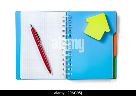 Opened Blue Notepad With Red Ballpoint Pen And Yellow Sticky Note Isoated Stock Photo