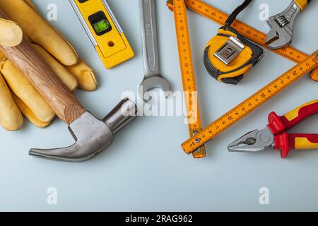 Construction Tools On Light Gray Background Stock Photo