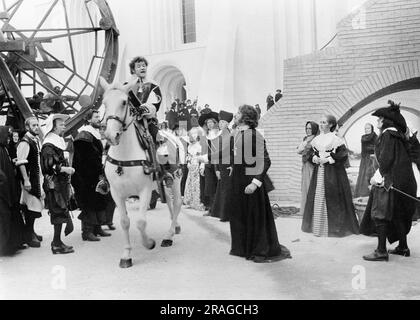 Dudley Sutton (on horse), Oliver Reed (right of horse), on-set of the Film, 'The Devils', Warner Bros., 1971 Stock Photo