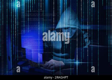 Anonymous man in mask with computers, source and binary code in darkness Stock Photo