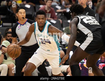 Sacramento, CA, USA. 3rd July, 2023. Charlotte Hornets Brandon Miller drives against San Antonio Spurs Sidy Cissoko during the California Classic Summer League at Golden 1 Center Monday, July 3, 2023 in Sacramento. (Credit Image: © Paul Kitagaki Jr./ZUMA Press Wire) EDITORIAL USAGE ONLY! Not for Commercial USAGE! Stock Photo