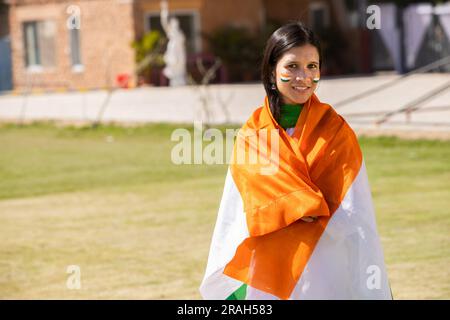 Free Photos - A Stunning Woman Wearing A Traditional Orange Indian Dress  And A Flag In The Background. Her Outfit Signifies A Connection To Her  Cultural Heritage, And She Appears Proud To