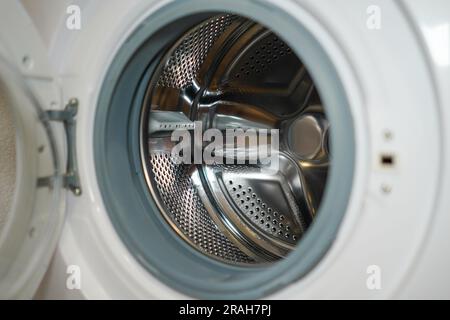 Washing machine's drum. Washing machine inside view of the drum. Stock Photo