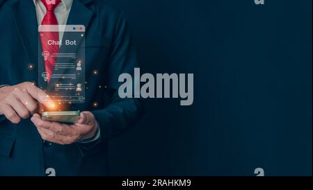 Businessman hand uses a smartphone to type live chat, ask, answer with an artificial intelligence system. chat bot. Ai. Stock Photo