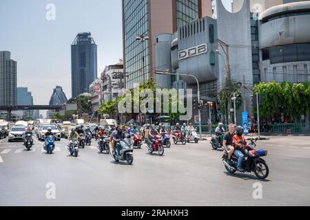 Scooters and motorbikes are one of the most common modes of transport in Bangkok Stock Photo