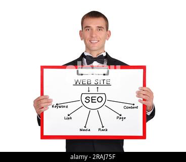 businessman in tuxedo holding clipboard with seo Stock Photo