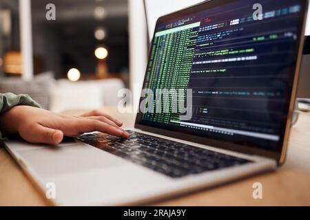 Programming, coding and hands typing on laptop for website, hacking and cybersecurity in office. Information technology, software and person on Stock Photo