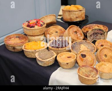 A Selection of Freshly Made Savoury and Sweet Pies. Stock Photo