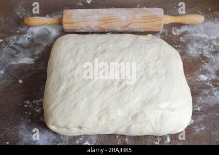 Homemade raw puff pastry. Dough ready before rolling. Stock Photo