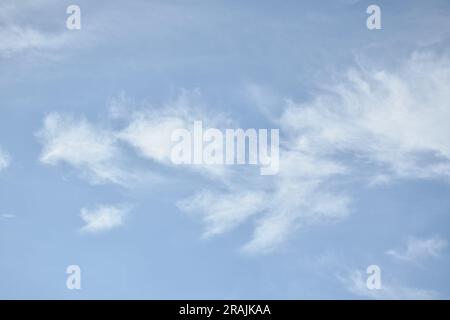 cloud spreading on bright sky in sunny day Stock Photo