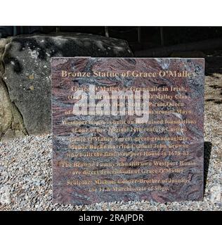 Information stone alongside the bronze statue of Grace O'Malley in the grounds of Westport House Stock Photo