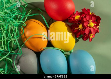colorful eggs symbolize easter. Easter minimal concept. Creative Happy Easter, spring layout. Stock Photo