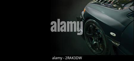 Front of black modify car on black background,copy space Stock Photo