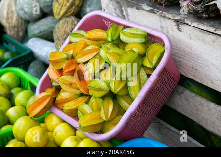Asterisa or star fruit is the fruit of the averrhoa carambola tree native to Indonesia, the Philippines and Malaysia. Stock Photo