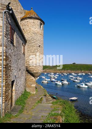 Port of Le conquet and old turret, a commune in the Finistère département of Brittany in northwestern France Stock Photo