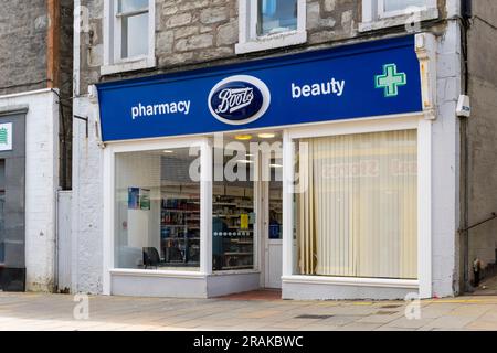Branch of Boots on Shetland. Stock Photo