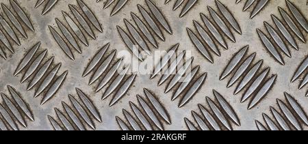 Dirty old diamond plate with dust and stain industrial checker tread texture Stock Photo