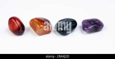 different colorful Semi Precious stones on white background Stock Photo