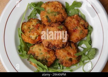 Traditional fish cakes served in the restaurant Stock Photo