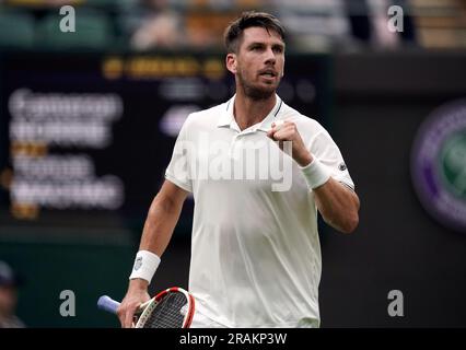 Cameron Norrie celebrates winning the first set against Milos Raonic ...