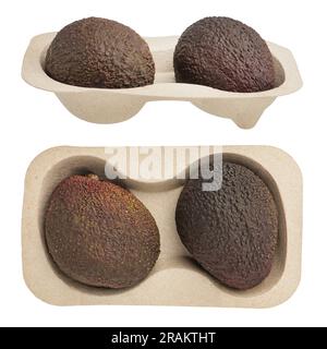 Avocado box. Eco cardboard tray with two ripe avocados isolated on a white background, from different sides. Stock Photo