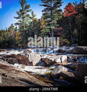 The Lower falls on the Swift River cascade through the White Mountains of New Hampshire. Stock Photo