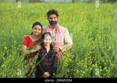 Indian farming Happy indian farmer standing in farm, sowing Empty Hands ...