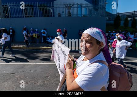 Tegucigalpa, Francisco Morazan, Honduras - November 25, 2022: Honduran Women Walking in a March on the International Day for the Elimination of Violen Stock Photo
