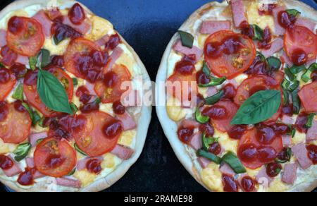 Prepared and baked pizza with various ingredients Stock Photo
