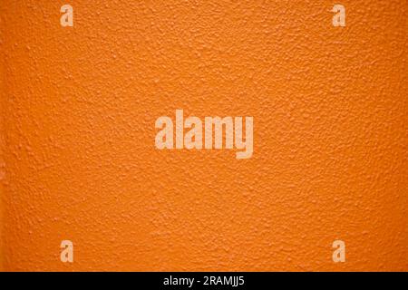Saturated intensive orange textured surface. Stock Photo