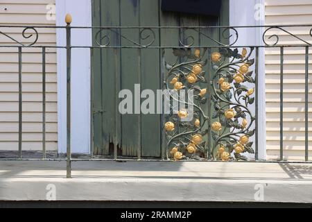 Intricate wrought iron railing with entwined roses in the French Quarter, New Orleans. Stock Photo