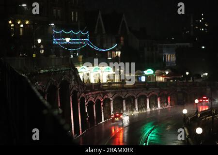 Ramsgate harbour and town on a wet and rainy night, in Thanet, Kent, UK. Stock Photo