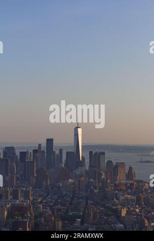 The sun sets over the Manhattan skyline on a midsummer evening in New York City, New York. Stock Photo
