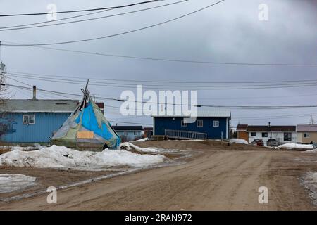 A typical street scene in in the Indigenous town of Fort Severn on Hudson Bay, the most northerly community in Ontario, Canada Stock Photo