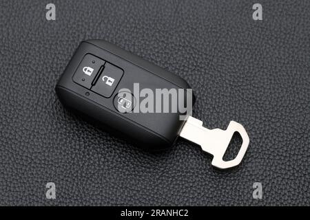 Car vehicle modern black key remote control have front button, slide-door button. Stock Photo