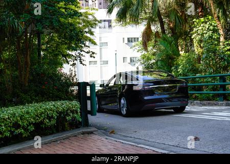 View of tall buildings and public roads in urban area of Hong Kong Stock Photo