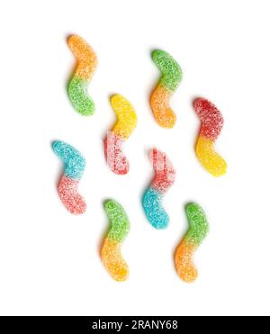 Multicolored gummies in sugar on a white background, top view. Jelly, marmalade sweets. Stock Photo