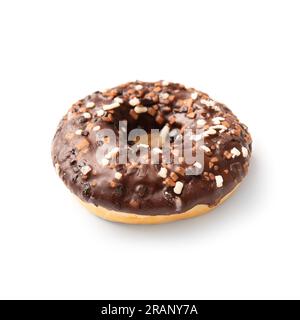One donut in chocolate glaze sprinkled with pieces of white, milk and dark chocolate isolated on a white background. High-calorie junk food. Stock Photo