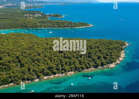 Aerial view of the rocky and forested coast of Rab Island, the Adriatic Sea in Croatia Stock Photo