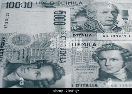 Banknotes of the Italian Lira of ten thousand and five thousand lire now out of monetary value after the entry of the euro, vintage image style. Stock Photo