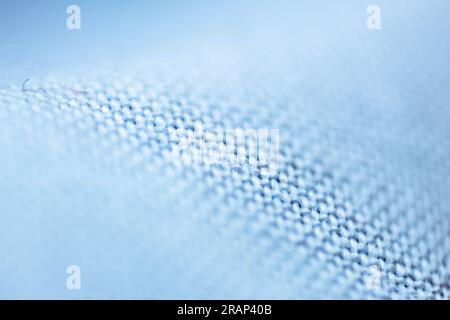 Textured background made with fabric mesh picked up in detail, close up and selective focus. Stock Photo