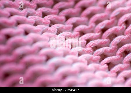Textured background made with fabric mesh picked up in detail, close up and selective focus. Stock Photo